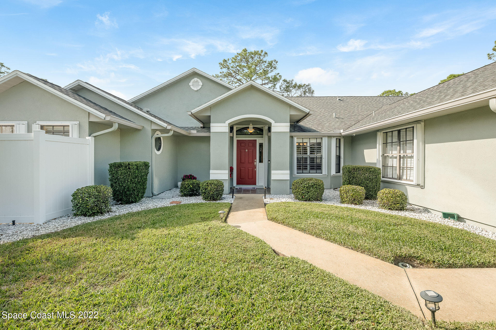 3500 Corey Road Malabar, FL 32950 - Photo 64 of 122 a front view of a house with garden