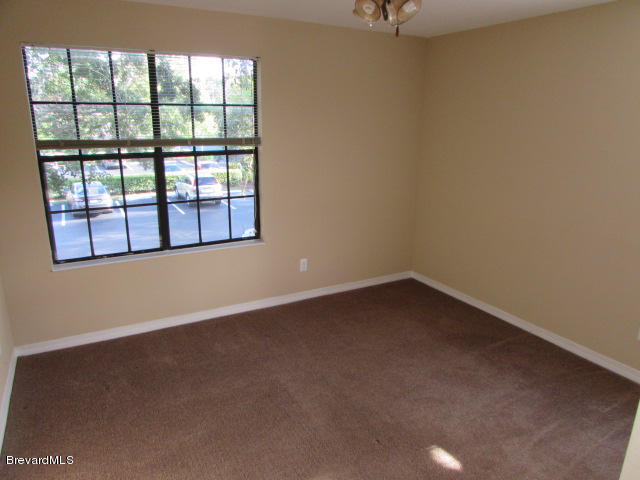 7667 North Wickham Road, Unit 1009 Melbourne, FL 32940 - Photo 8 of 10 Bedroom 2