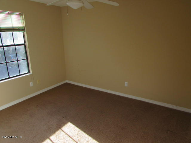 7667 North Wickham Road, Unit 1009 Melbourne, FL 32940 - Photo 9 of 10 Bedroom 3
