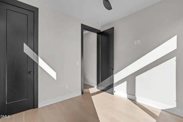 a view of a hallway with staircase