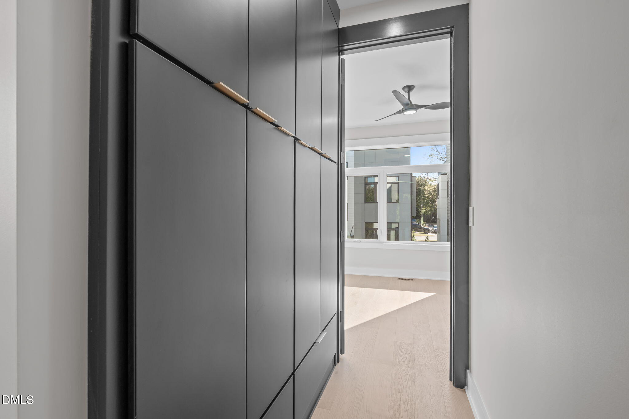 226 Woodsborough Place Raleigh, NC 27601 - Photo 12 of 42 a bathroom with a glass shower door and mirror