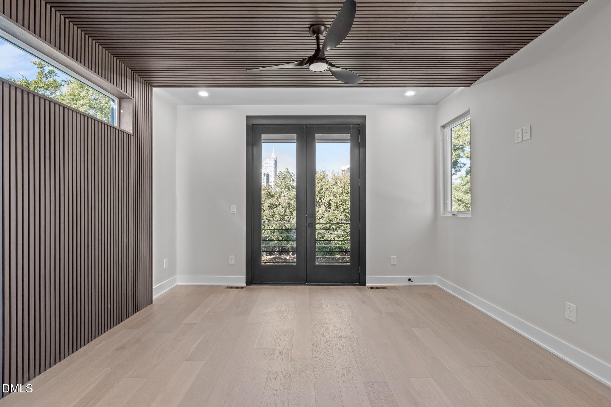 226 Woodsborough Place Raleigh, NC 27601 - Photo 15 of 42 a view of an empty room with a window