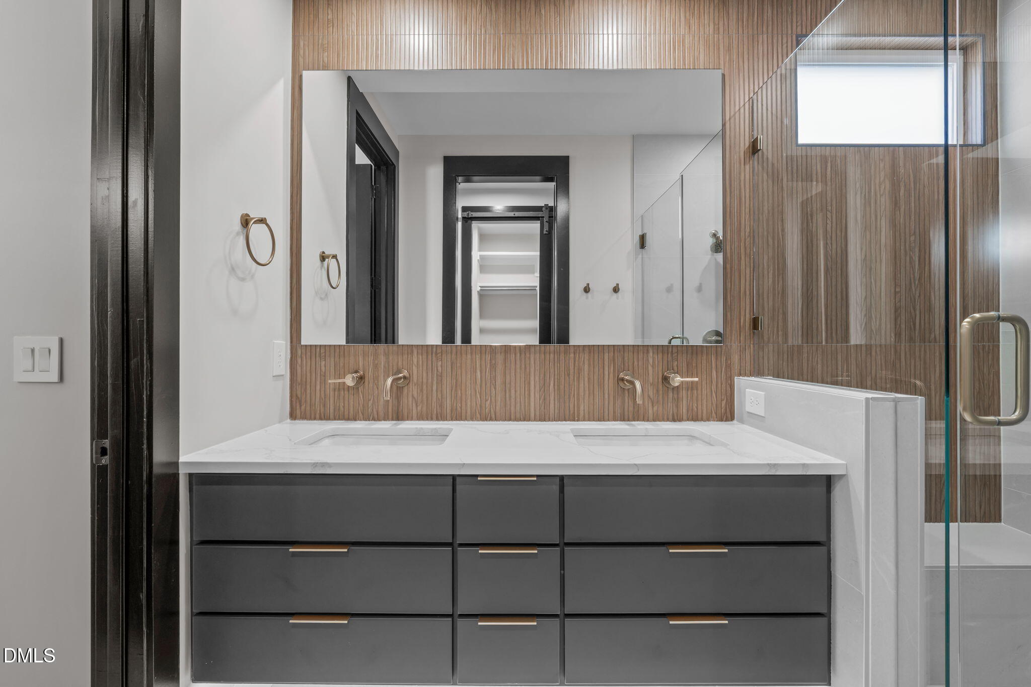 226 Woodsborough Place Raleigh, NC 27601 - Photo 19 of 42 a bathroom with a sink and a mirror