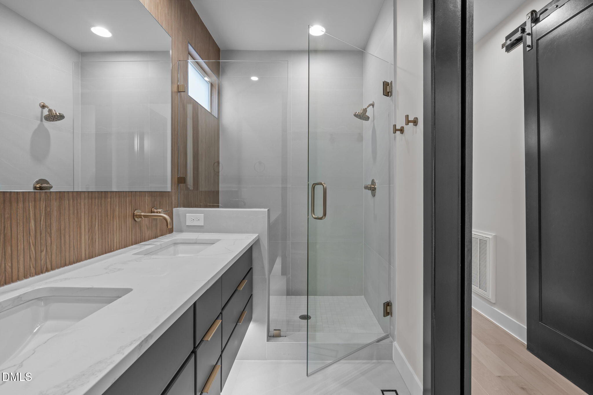 226 Woodsborough Place Raleigh, NC 27601 - Photo 20 of 42 a bathroom with a sink and a mirror