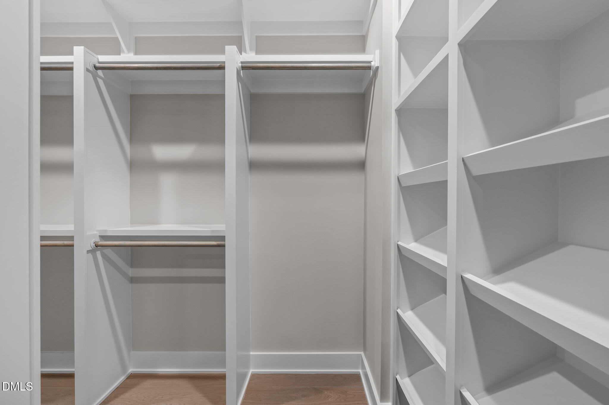 226 Woodsborough Place Raleigh, NC 27601 - Photo 21 of 42 a view of an empty walk in closet