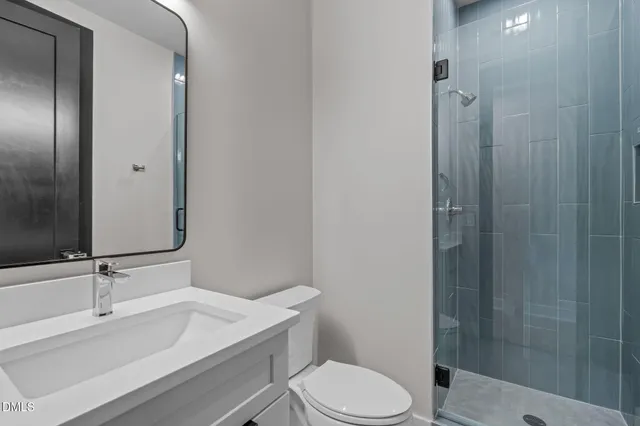 a view of an outdoor space with wooden floor and lake view