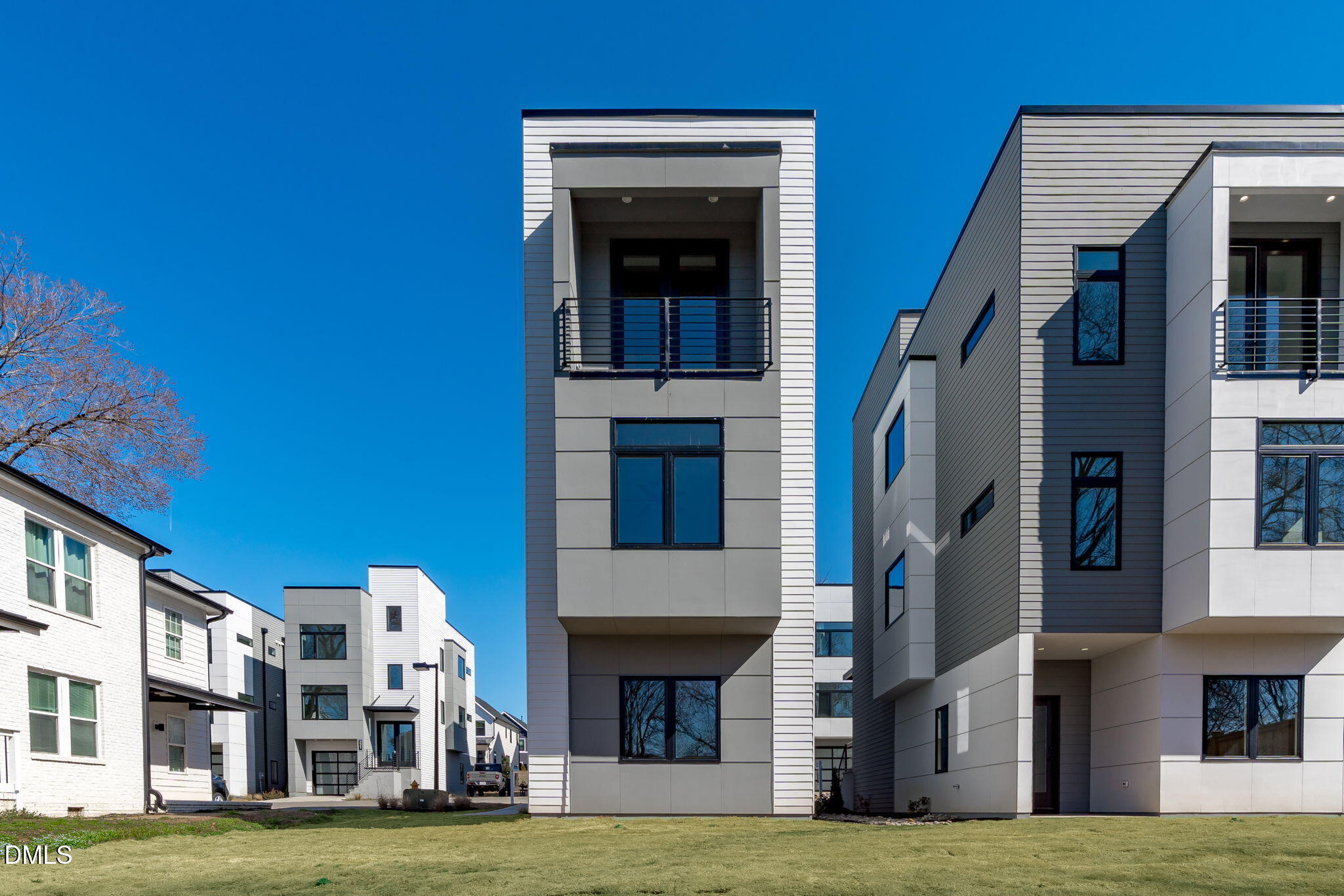 226 Woodsborough Place Raleigh, NC 27601 - Photo 30 of 42 a view of building with yard