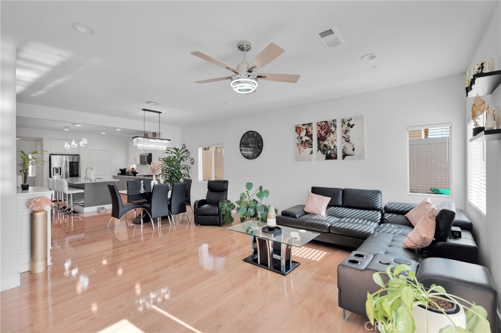 35153 Webb Place Beaumont, CA 92223 - Photo 16 of 42 a living room with furniture and a large window
