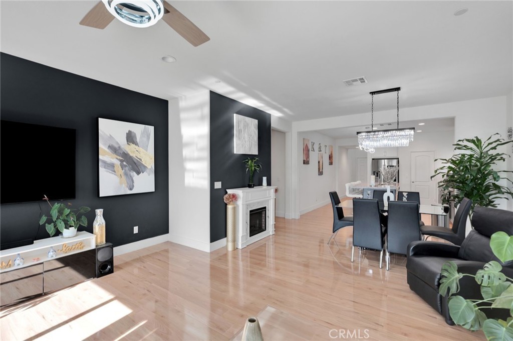 35153 Webb Place Beaumont, CA 92223 - Photo 17 of 42 a living room with furniture and a flat screen tv