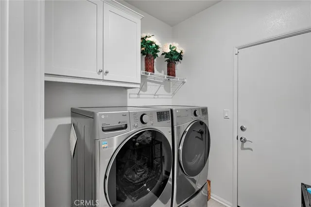 a bathroom with a sink toilet and a mirror