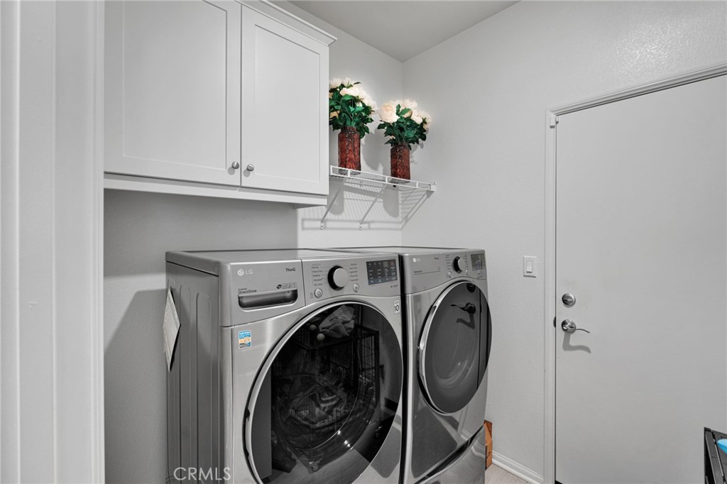 35153 Webb Place Beaumont, CA 92223 - Photo 18 of 42 a view of entryway with washer and dryer