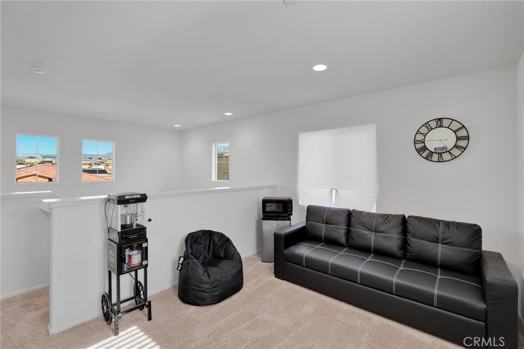 35153 Webb Place Beaumont, CA 92223 - Photo 21 of 42 a living room with furniture and a couch