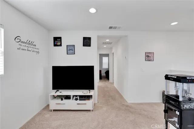 a bathroom with a granite countertop sink toilet a large mirror a bathtub and shower