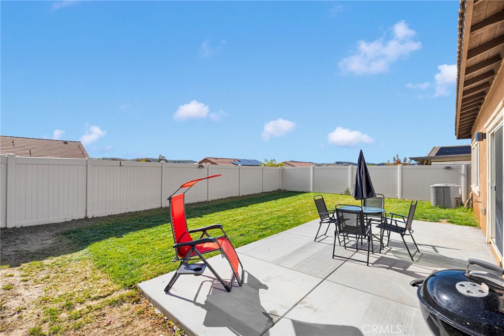 35153 Webb Place Beaumont, CA 92223 - Photo 35 of 42 a view of a backyard with furniture and a garden