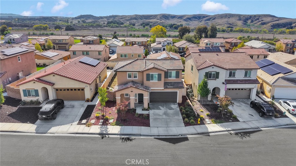 35153 Webb Place Beaumont, CA 92223 - Photo 5 of 42 an aerial view of residential houses with outdoor space