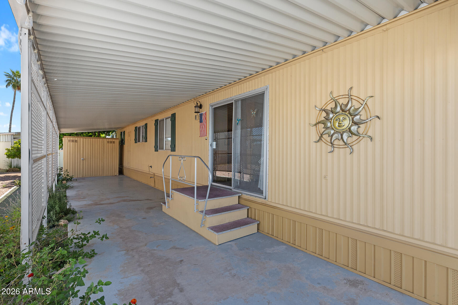 10540 East Apache Trail, Unit 151 Apache Junction, AZ 85120 - Photo 28 of 31 a view of a porch with furniture