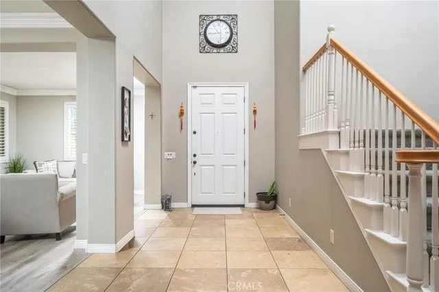 a view of an entryway with wooden floor