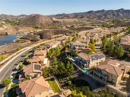 an aerial view of a city with lake view