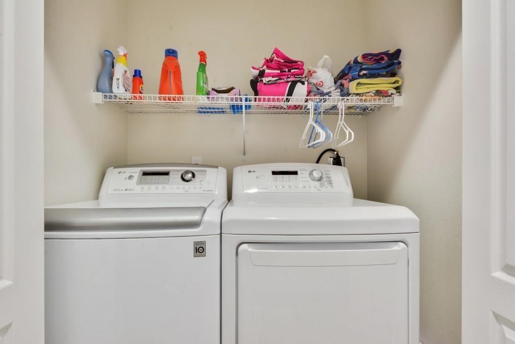 11203 Ranch Road 2222, Unit 1602 Austin, TX 78732 - Photo 20 of 25 a utility room with dryer and washer