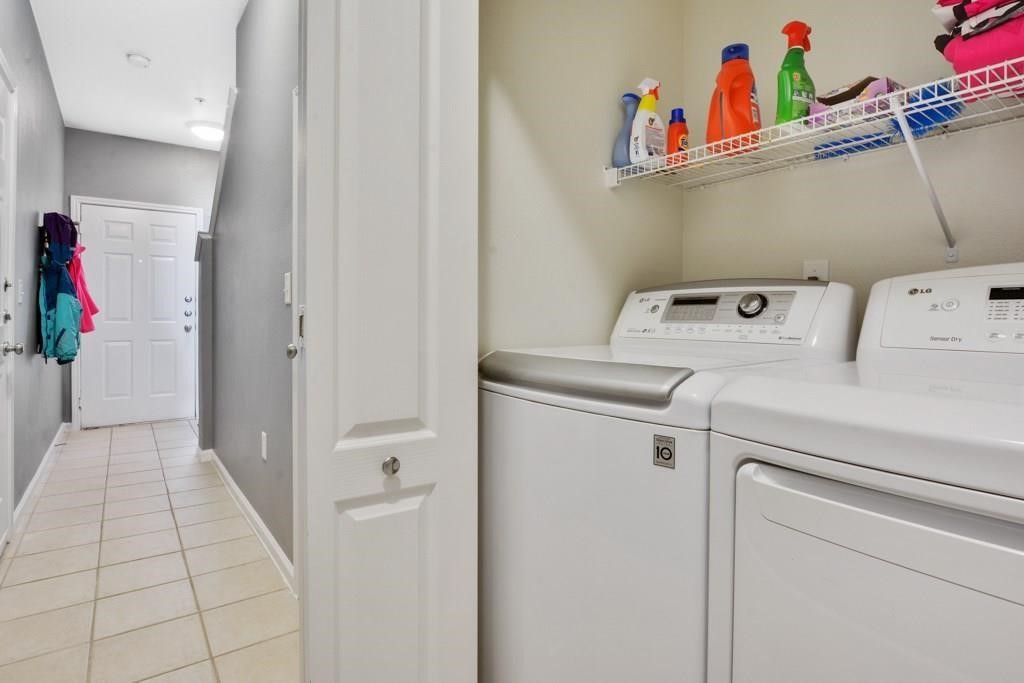 11203 Ranch Road 2222, Unit 1602 Austin, TX 78732 - Photo 21 of 25 a utility room with dryer and washer