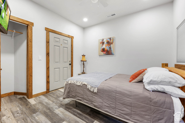 2029 West Tollgate Road Coalville, UT 84017 - Photo 26 of 43 Bedroom featuring wood finished floors, a ceiling fan, and recessed lighting