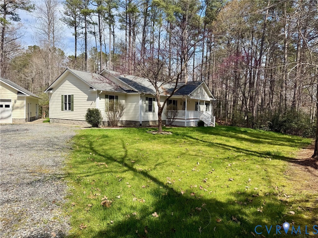 43 Ruddy Duck Road Heathsville, VA 22473 - Photo 3 of 46 a front view of house with yard and green space