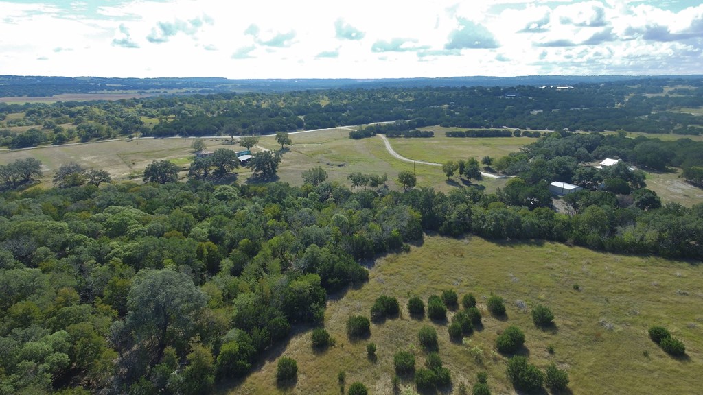 800 Schumann Road Stonewall, TX 78671 - Photo 5 of 27 a view of an outdoor space and mountain view