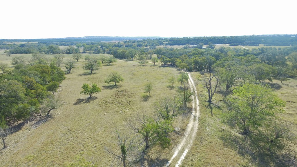 800 Schumann Road Stonewall, TX 78671 - Photo 9 of 27 a view of lake with mountain