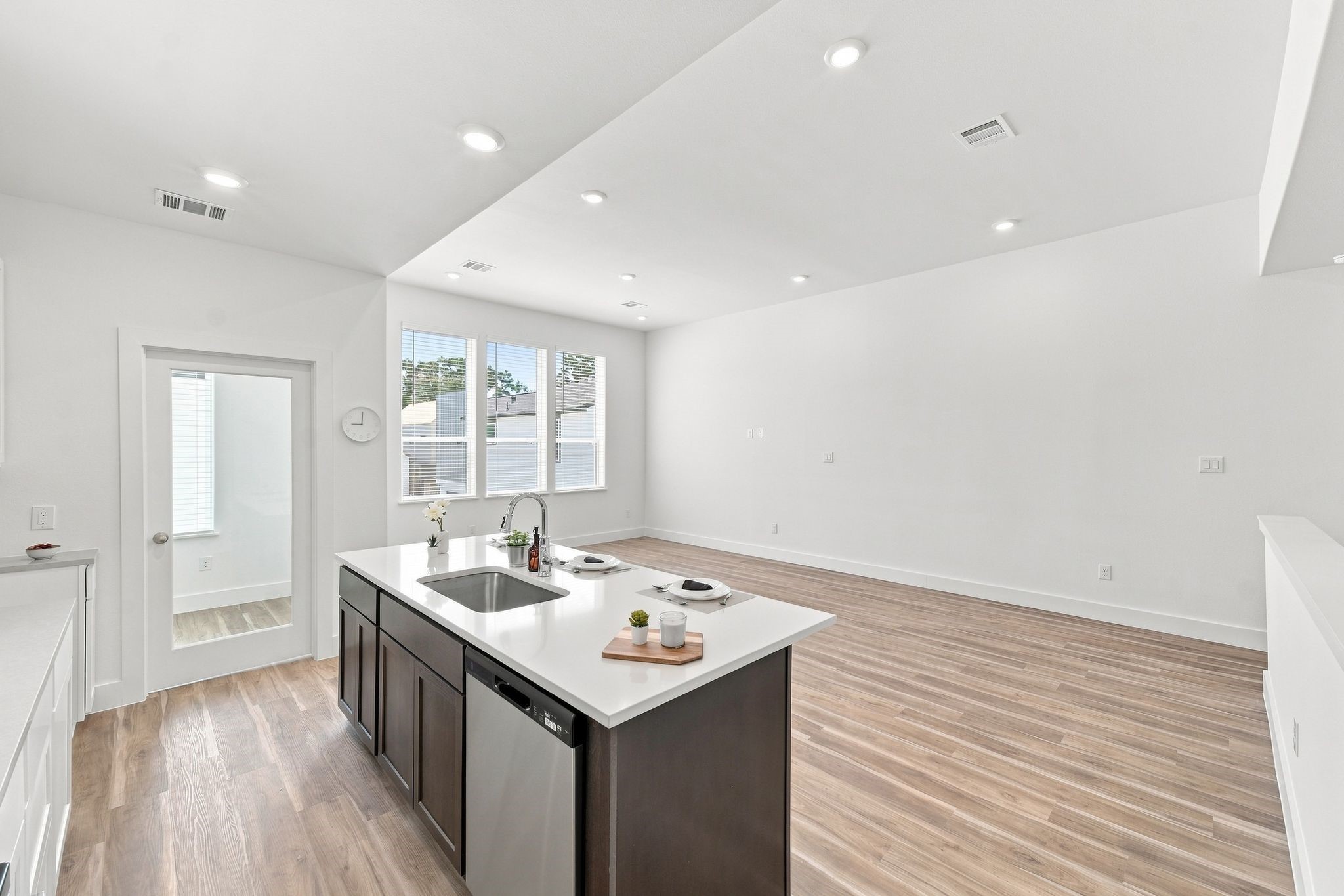 6057 Cebra Street Houston, TX 77091 - Photo 21 of 42 Bright and versatile upstairs living space with an open layout, recessed lighting, and abundant natural light. Photos are from a different property with a similar floor plan. Finishes, features, and orientation may vary.