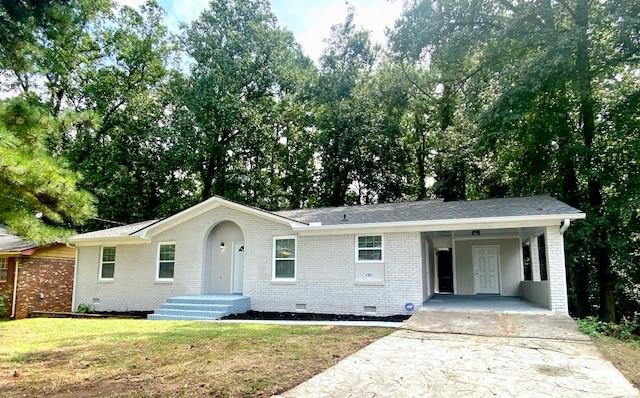 4061 Northstrand Drive Decatur, GA 30035 - Photo 1 of 1 a front view of a house with a yard