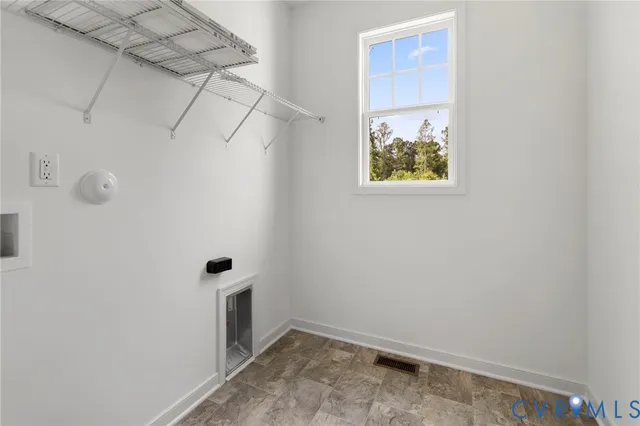 a view of a hallway with windows