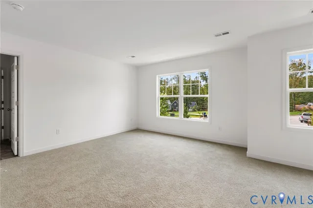 an empty room with windows