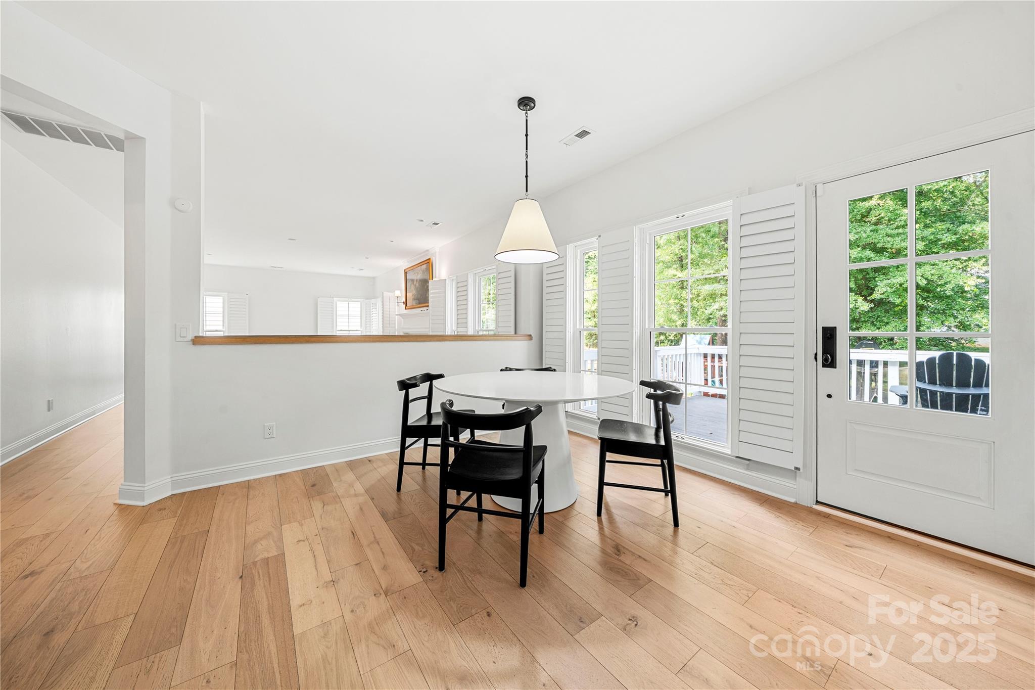 8500 Headford Road Charlotte, NC 28277 - Photo 12 of 47 a view of a dining room with furniture window and wooden floor