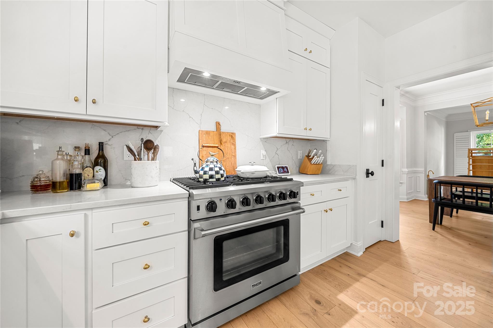 8500 Headford Road Charlotte, NC 28277 - Photo 15 of 47 a kitchen with white cabinets and appliances