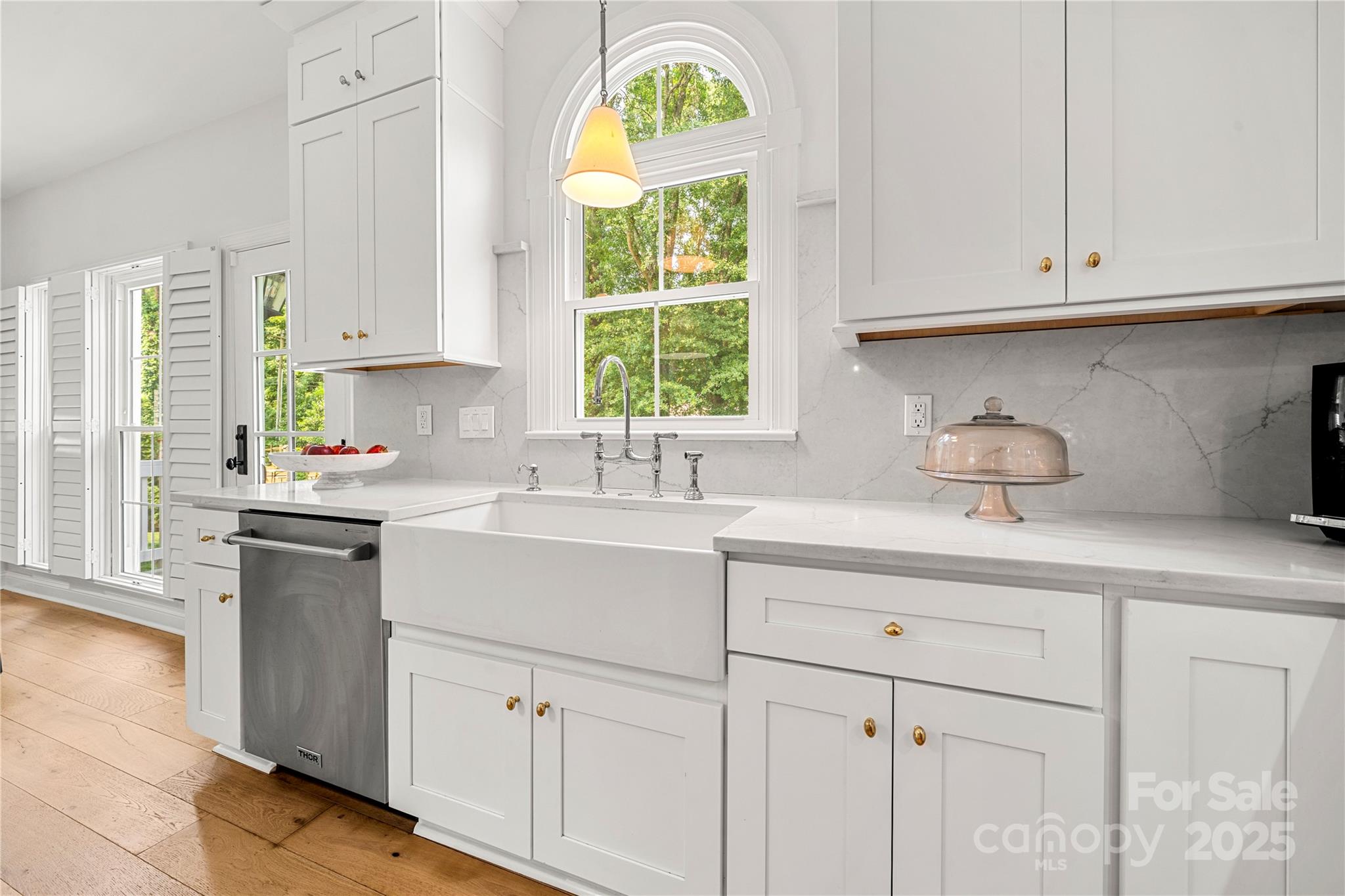 8500 Headford Road Charlotte, NC 28277 - Photo 17 of 47 a kitchen with stainless steel appliances granite countertop a sink a window and cabinets