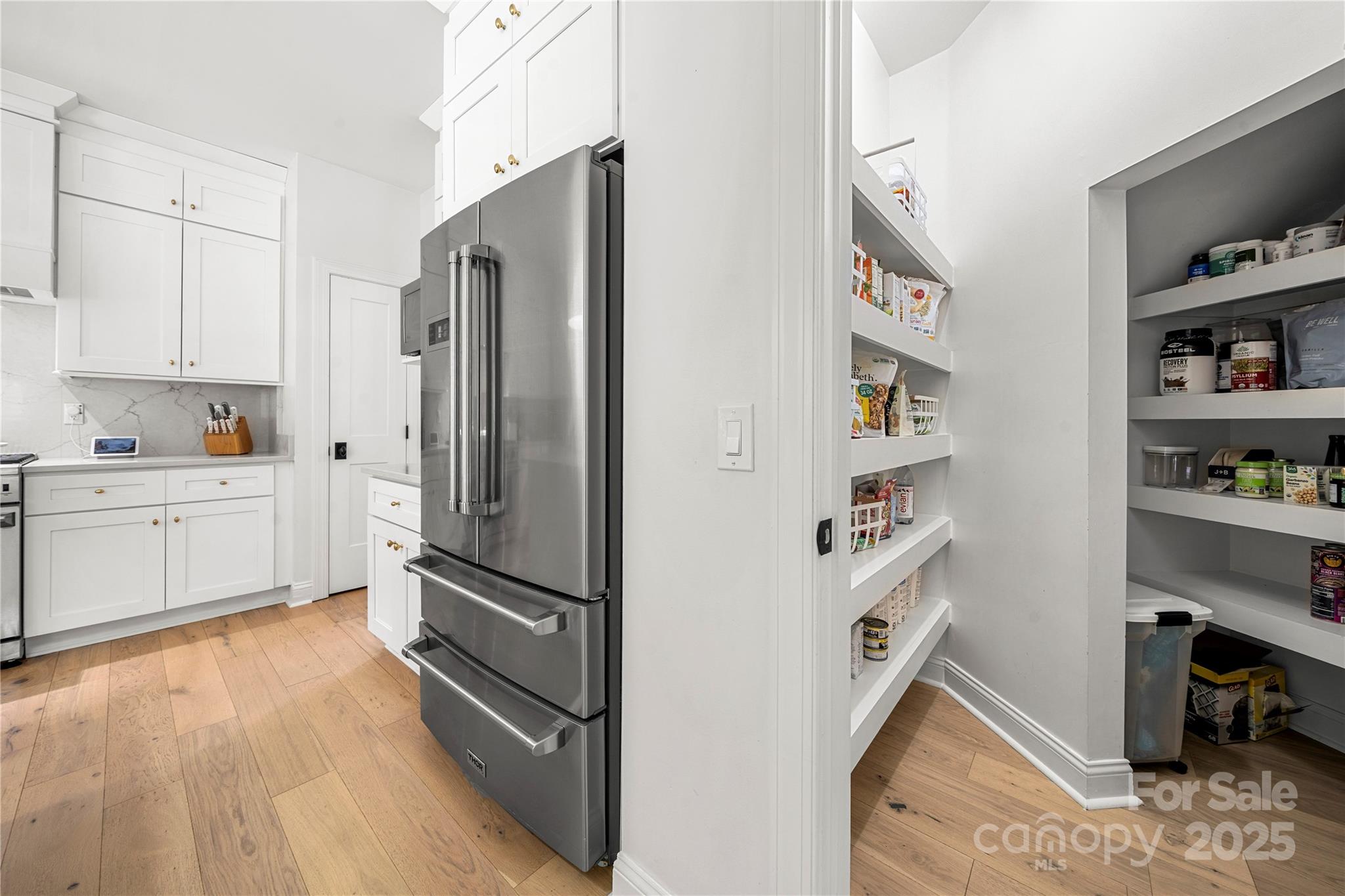 8500 Headford Road Charlotte, NC 28277 - Photo 20 of 47 a kitchen with stainless steel appliances a refrigerator sink and cabinets