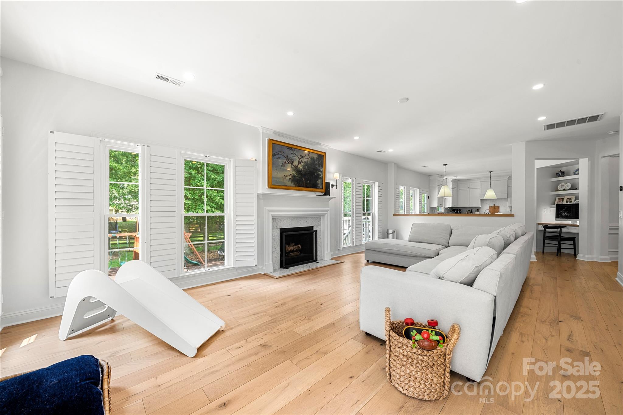 8500 Headford Road Charlotte, NC 28277 - Photo 23 of 47 a living room with furniture window and a fireplace