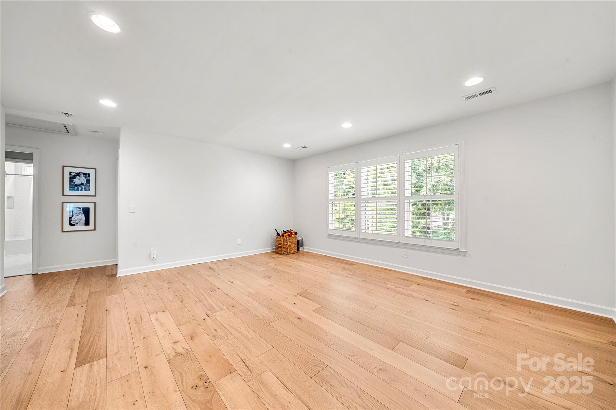 8500 Headford Road Charlotte, NC 28277 - Photo 27 of 47 a view of empty room with wooden floor and fan