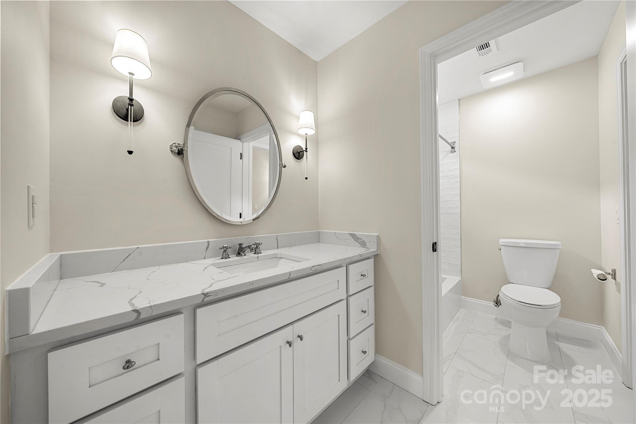 8500 Headford Road Charlotte, NC 28277 - Photo 33 of 47 a bathroom with a toilet sink and mirror