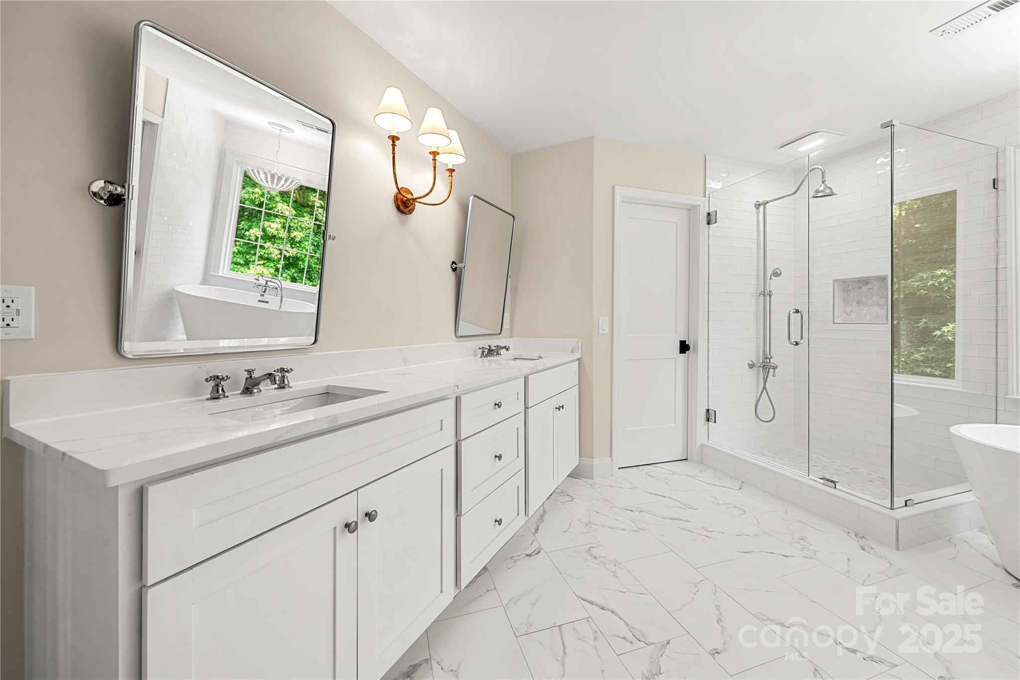 8500 Headford Road Charlotte, NC 28277 - Photo 38 of 47 a spacious bathroom with a shower sink and mirror