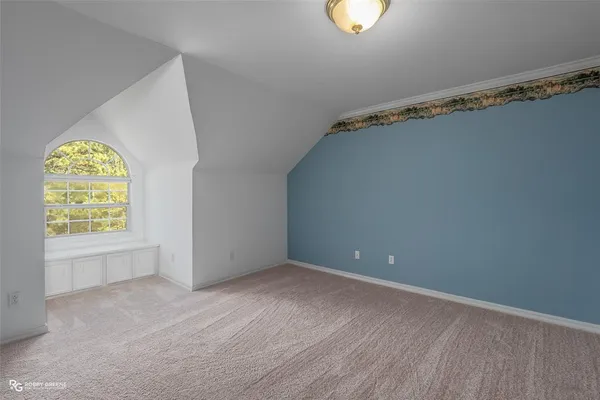 a view of a room with an empty space