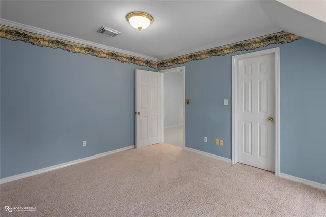 a spacious bathroom with a granite countertop sink mirror and double