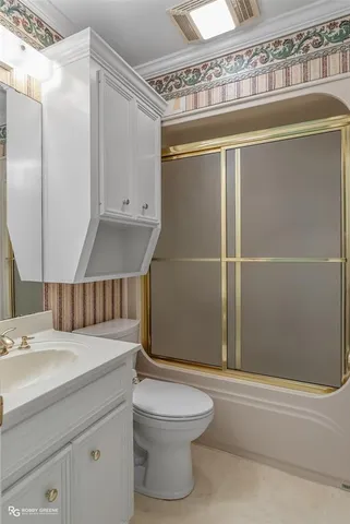 a kitchen with white cabinets