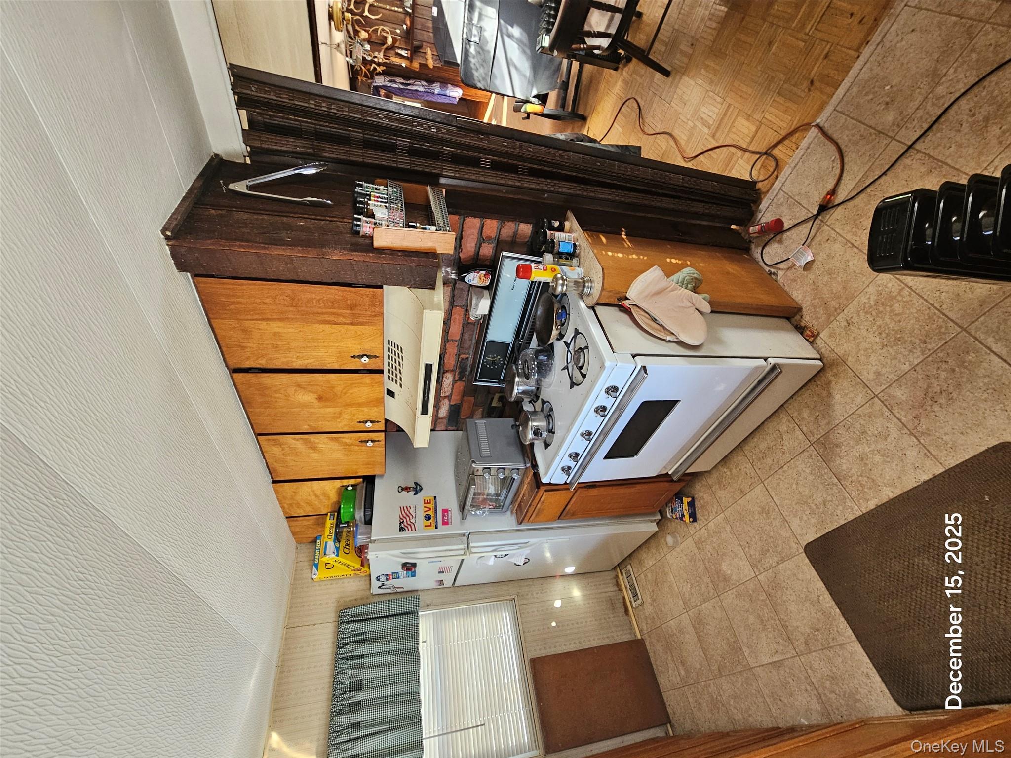 3485 Highway 9 Cold Spring, NY 10516 - Photo 6 of 10 a kitchen with stainless steel appliances granite countertop a stove a sink and a refrigerator