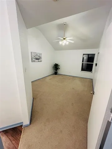 a view of a big room with carpet