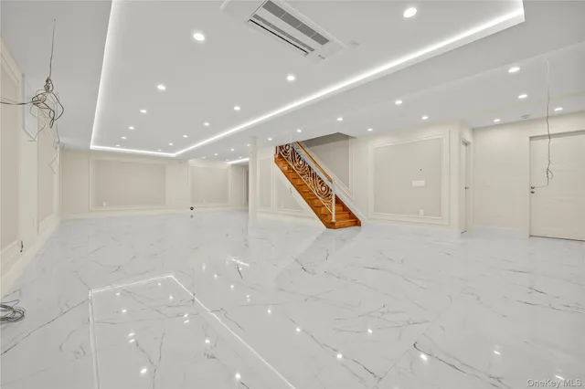 a view of a hall with an entryway