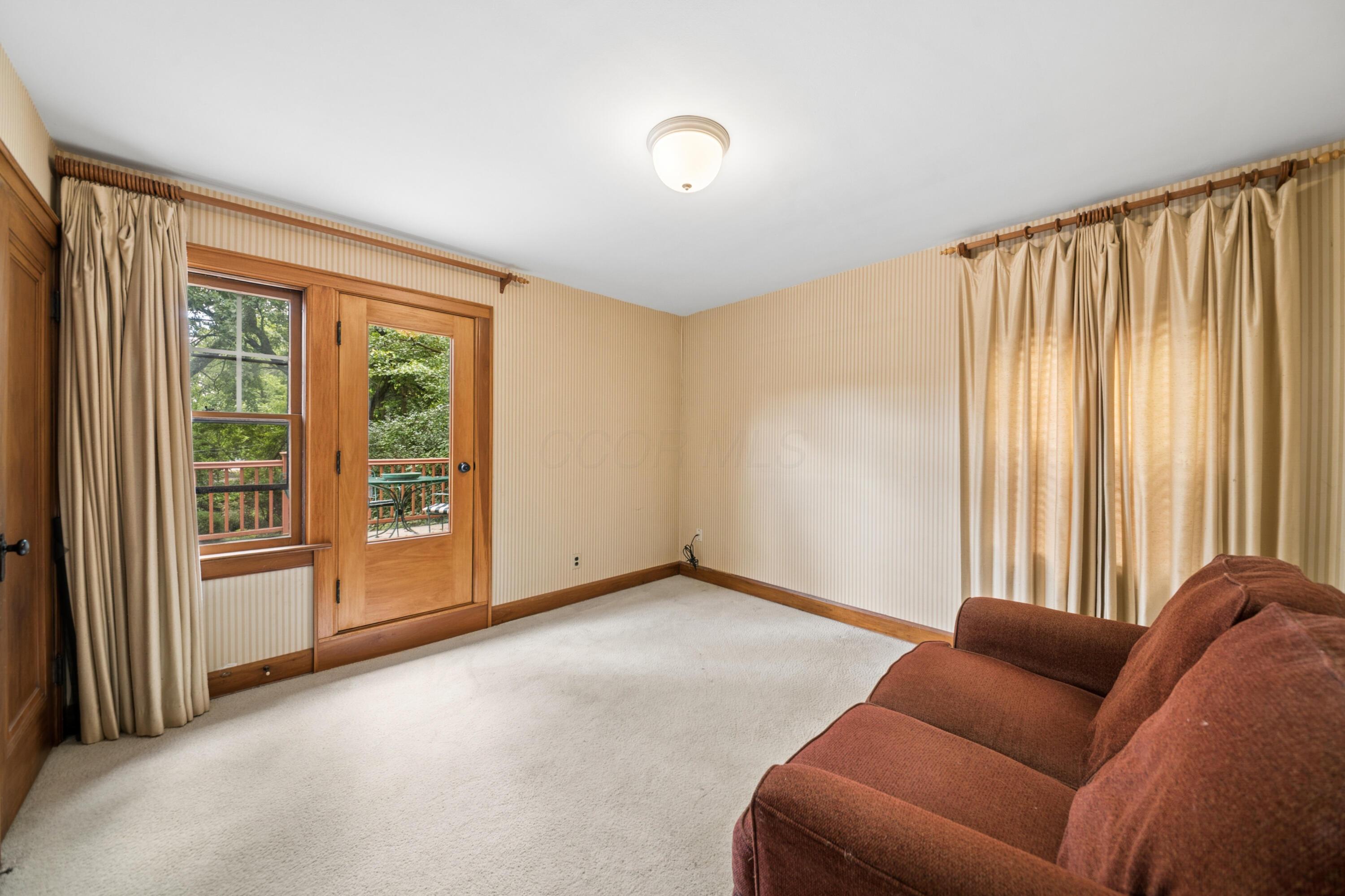 393 Mimring Road Columbus, OH 43202 - Photo 31 of 55 Bedroom 1 with cedar closet, access to second floor balcony