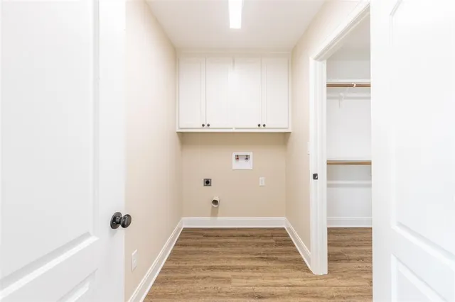 a view of a livingroom with wooden floor