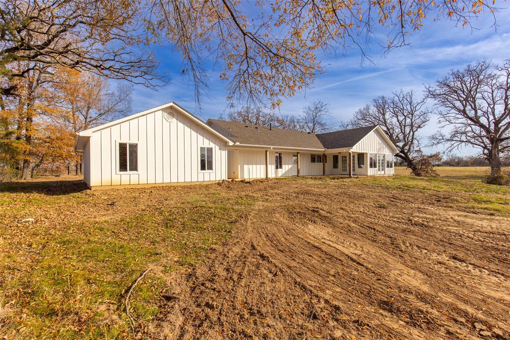 315 Private Road 7327 Emory, TX 75440 - Photo 2 of 39 a view of house with yard