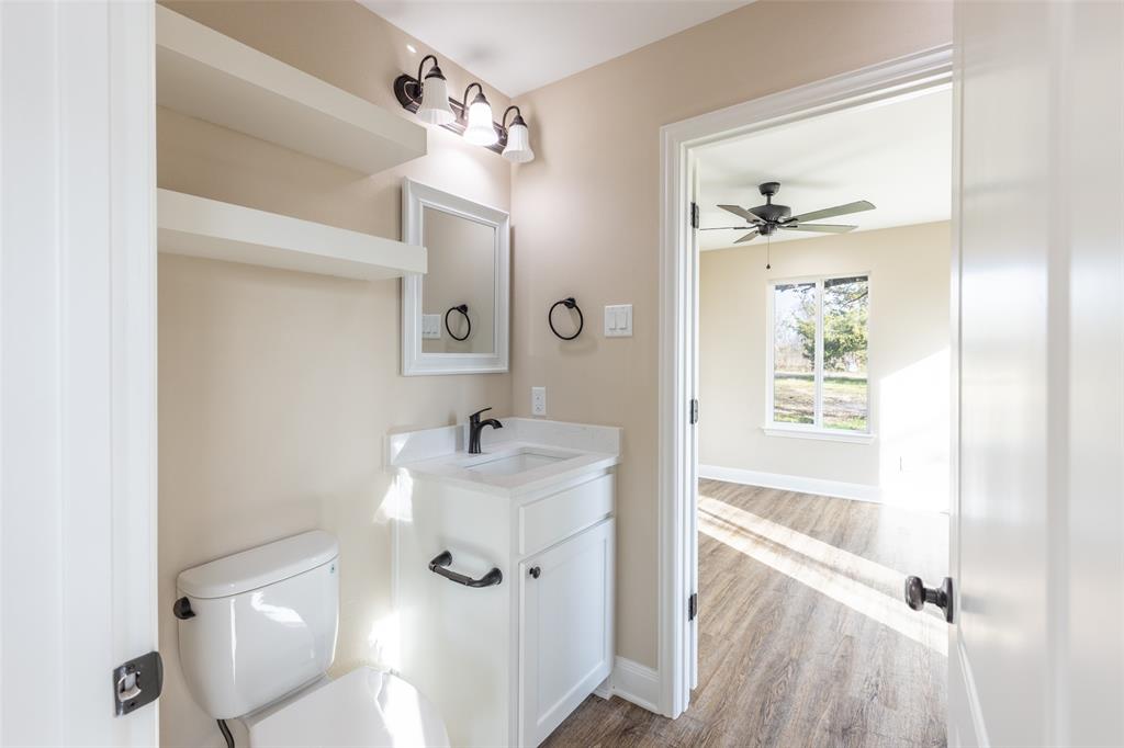 315 Private Road 7327 Emory, TX 75440 - Photo 22 of 39 a bathroom with a bathtub and a sink